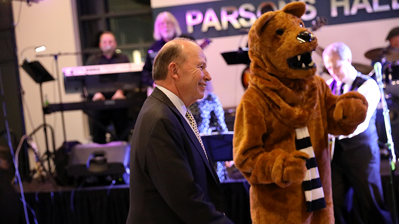Jerry Parsons dancing with Nittany Lion at the Brandywine Ball