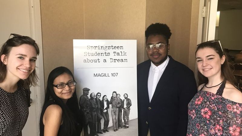 Students with poster at Springsteen conference