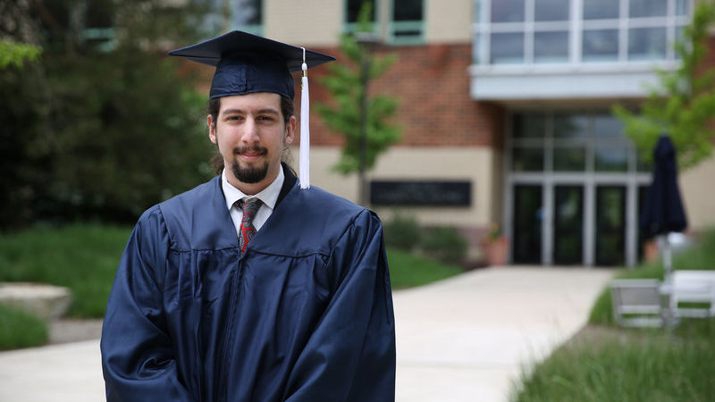 Joseph Longobardi in his cap and gown at commencement