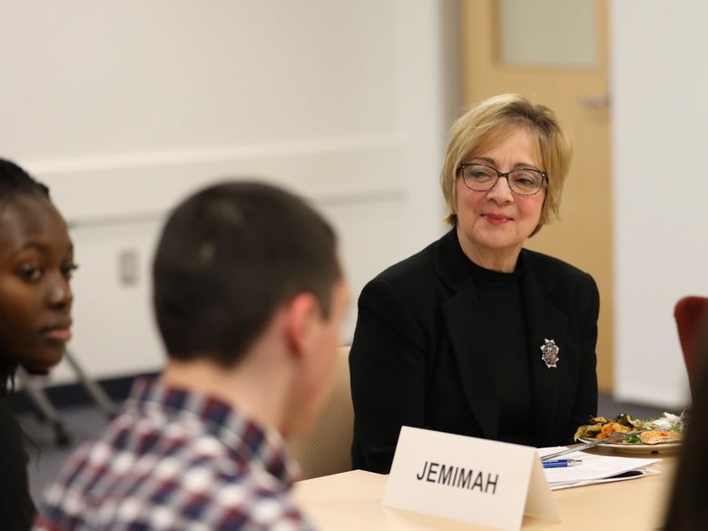 Chancellor Marilyn J. Wells listening to student panel.