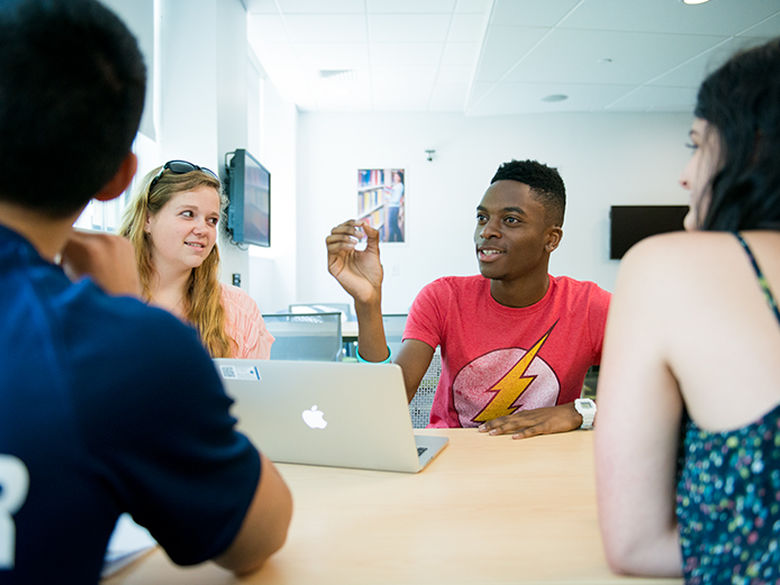 Students working together at table