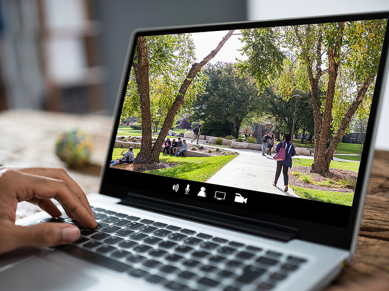 Student taking a virtual tour on a laptop