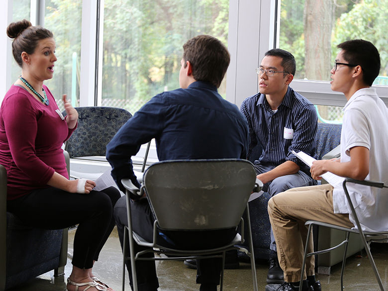 students networking with alumni