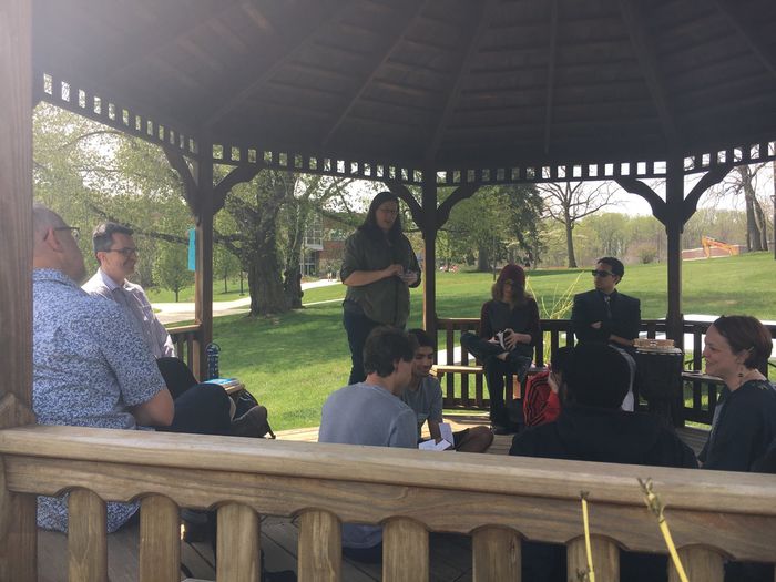 Joy speaking in the gazebo