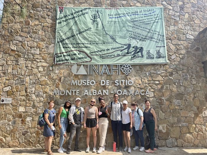 Students and faculty advisors in front of a museum in Oaxaca