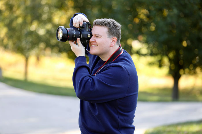Mike McDade taking a photo at Penn State Brandywine