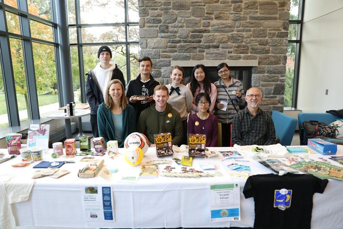 Students and staff participating in a Fair Trade event on campus