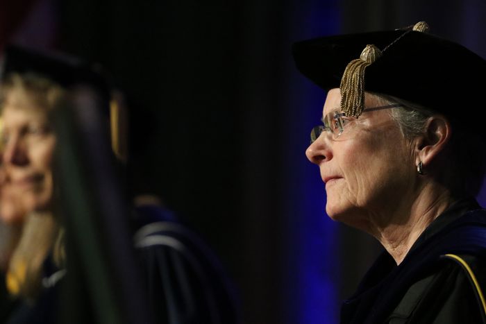 Brandywine chancellor sits on stage