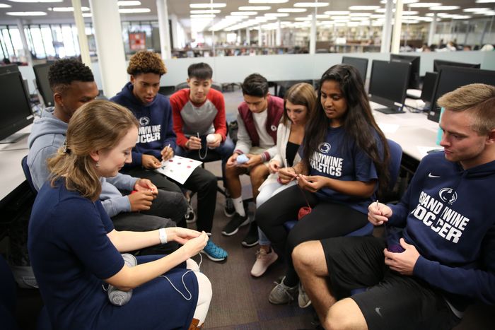 The Mathematics Club crocheting "coral" as part of Earth Science Week. 