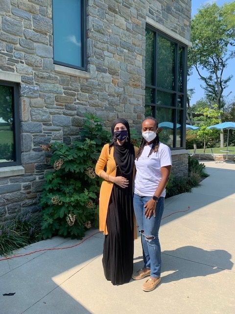 Kimeta Straker and Rabia Rafiqzadah stand outside the Student Union at Penn State Brandywine. 