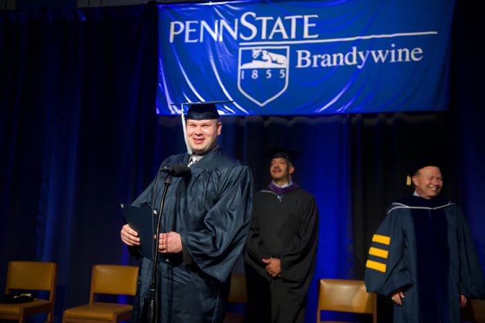 Photo of student graduating.