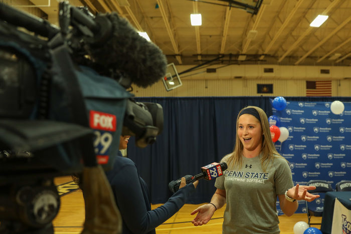 A female Brandywine student speaks to a television reporter.