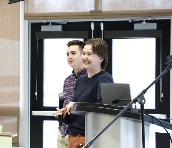 Cortez Catalano and Gracie Guerin speaking in the Tomezsko Lounge