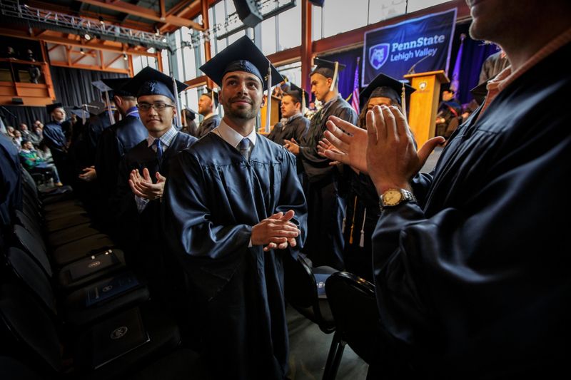 Students clapping at Commencement