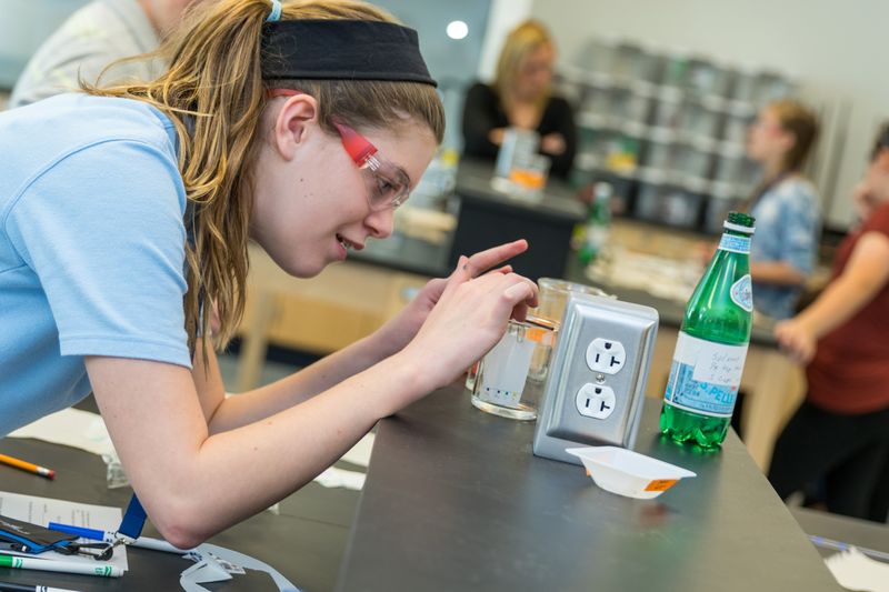 7th-grade girl explore Chemistry 