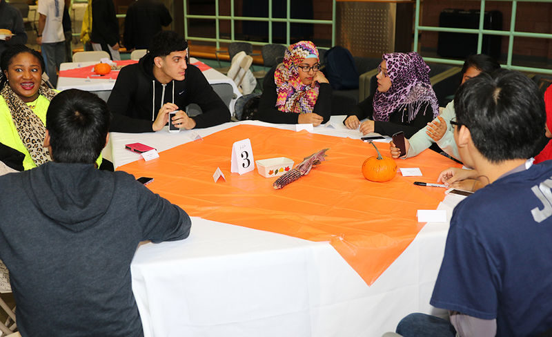 Students seated at Thanksgiving table