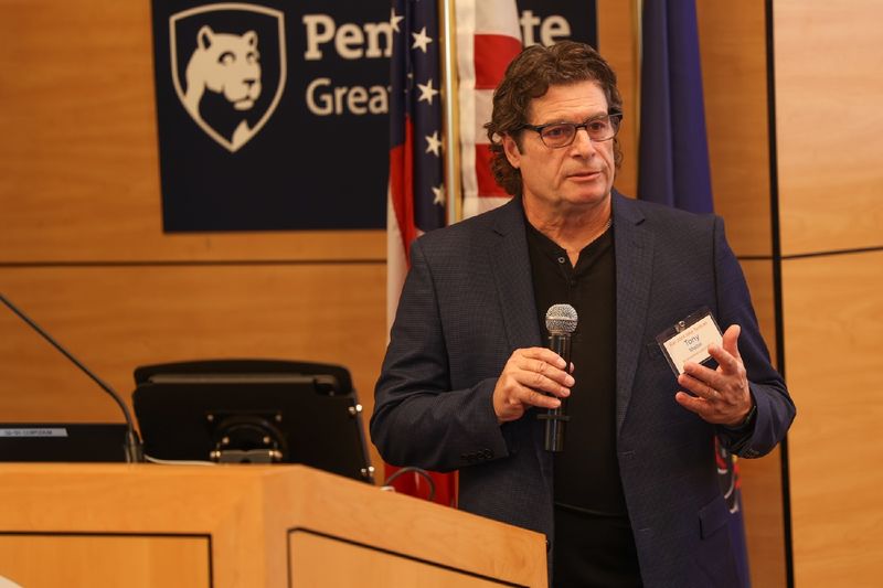 man speaking into microphone