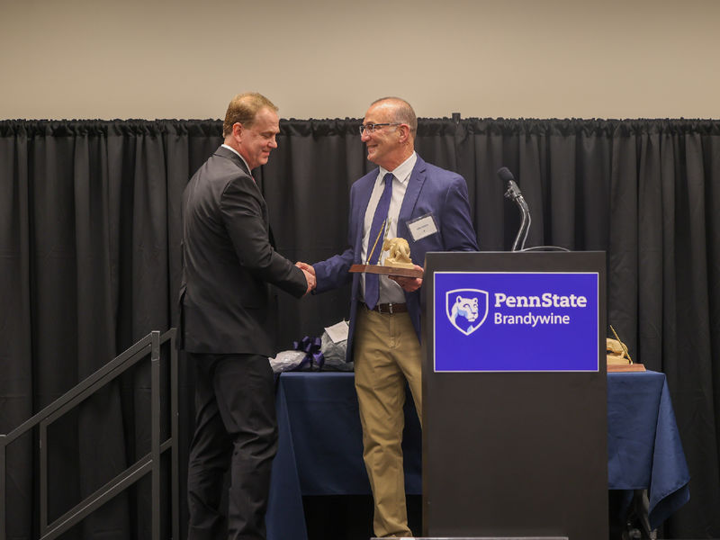 man receiving award