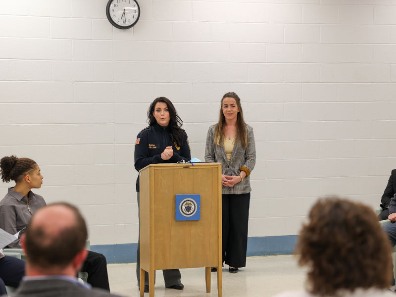 Laura Williams and Kelly Shaw standing at a podium