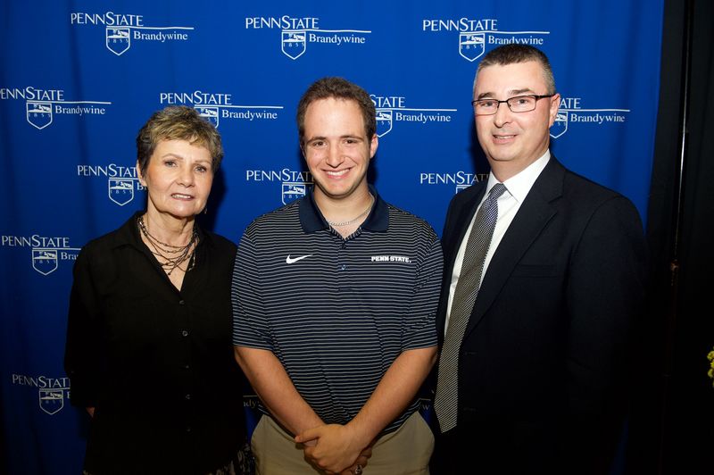 Paul Alberici stands with scholarship donors.