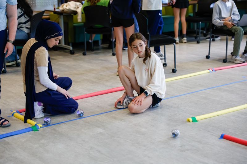 students participating in coding workshop