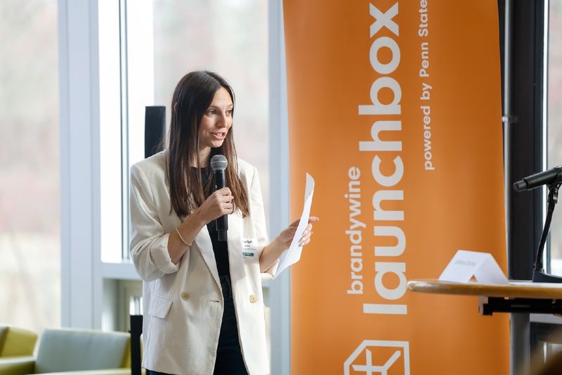 woman speaking into microphone