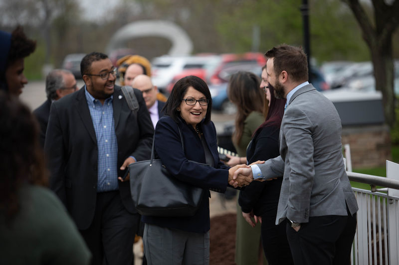 President-elect Neeli Bendapudi shakes hands