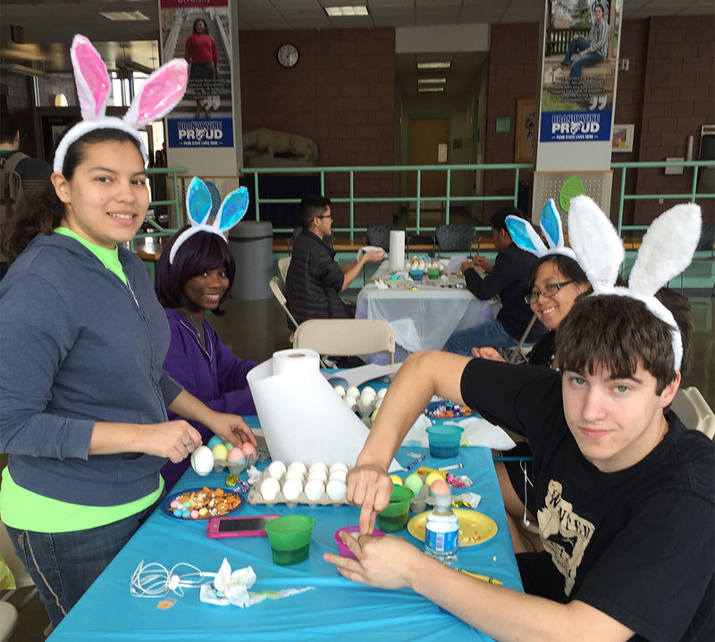 Students decorating eggs