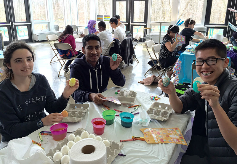 Students decorating eggs