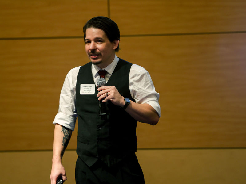 man on stage with a microphone