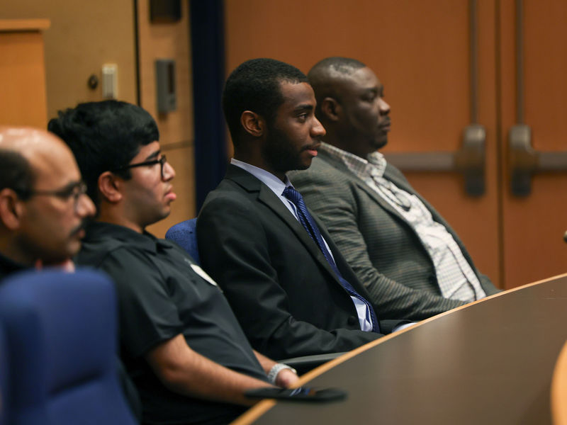 audience members in auditorium