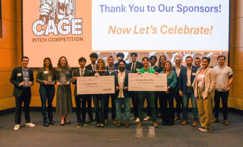 contestants holding large checks