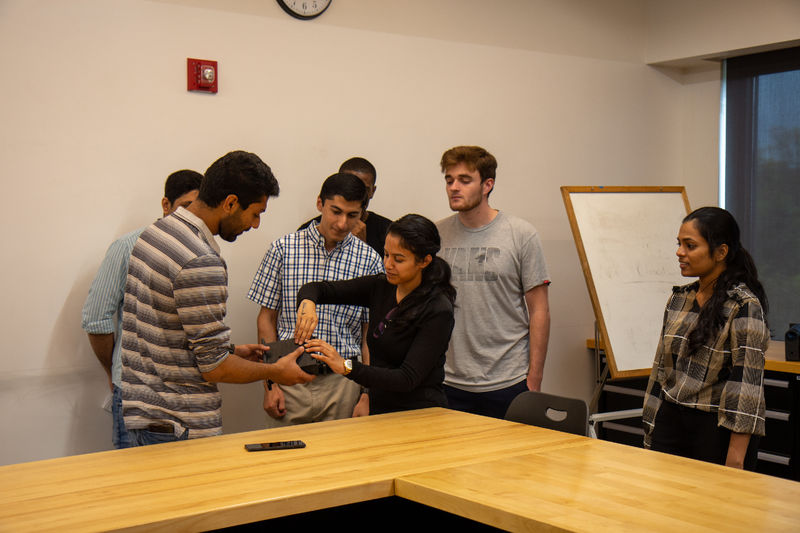 Students working on the 3D printed iLenz prototype