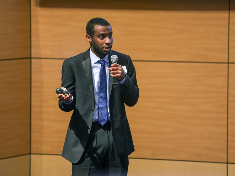 man speaking on stage