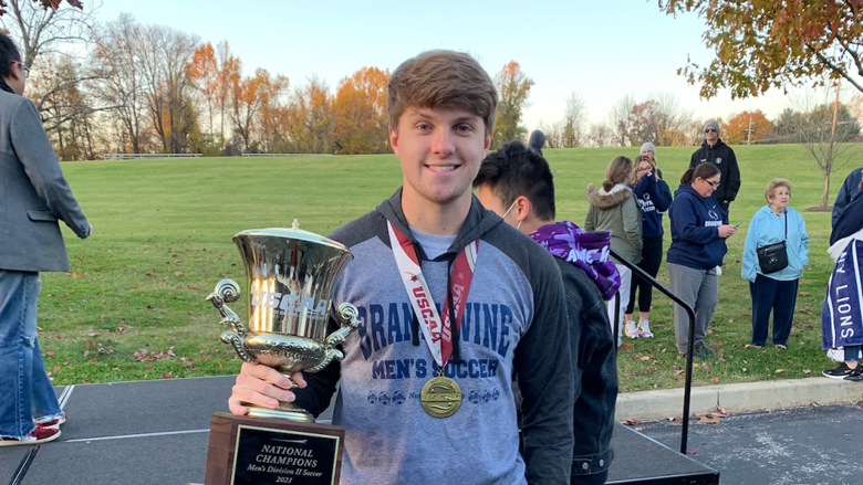 Benjamin Sarafinas holding a trophy