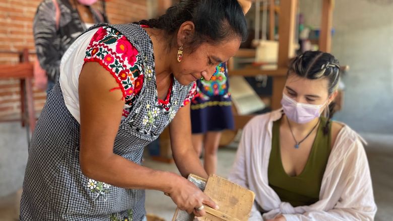Woman from Oaxaca with Penn State student