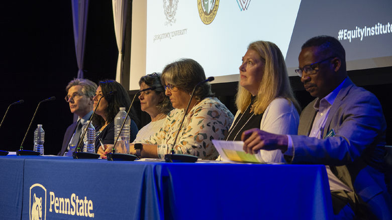 Penn Staters host a workshop panel on a stage at the Penn State Harrisburg campus