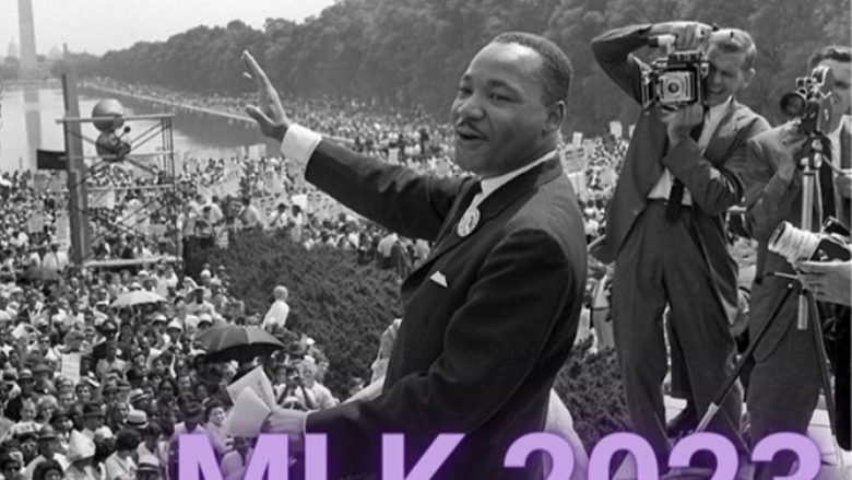 Martin Luther King Jr. waving in Washington DC with "MLK 2023" in the bottom right corner