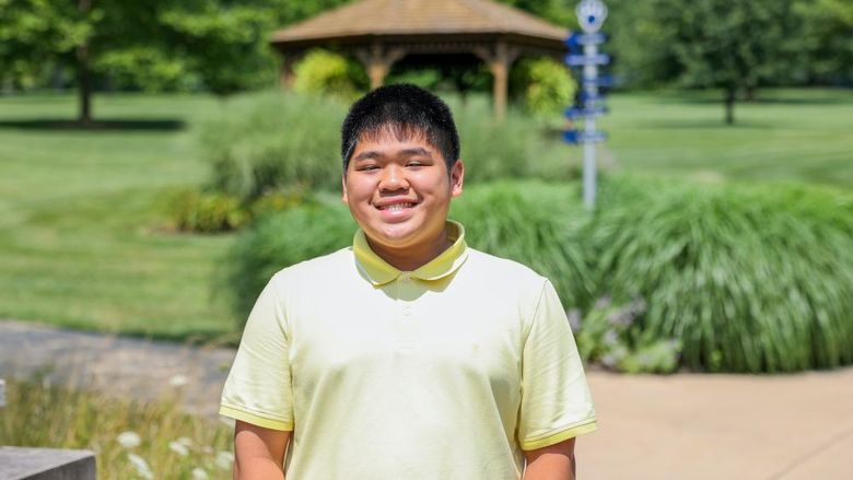 man in yellow shirt