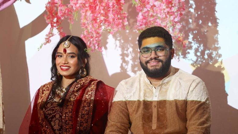 Shawlen Nahar and Faisal Rashidi as bride and groom at mock South Asian wedding