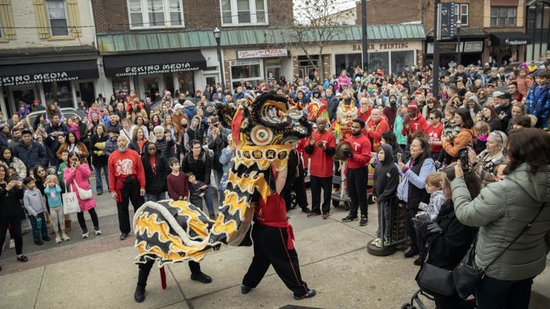 group of people watching dragon dance in Media, PA