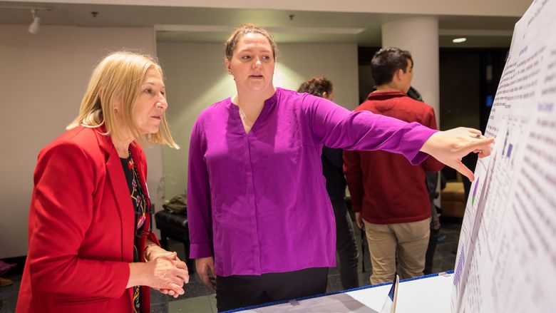 A Penn State Brandywine engineering student speaks with a professor. 