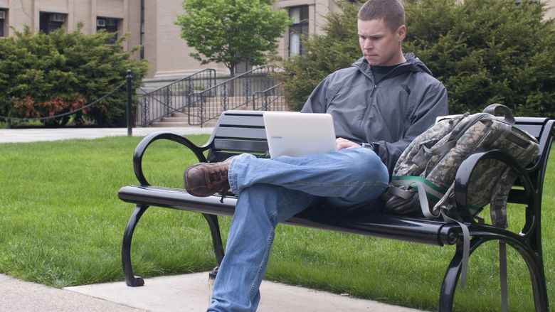 Student studying outside Burrowes