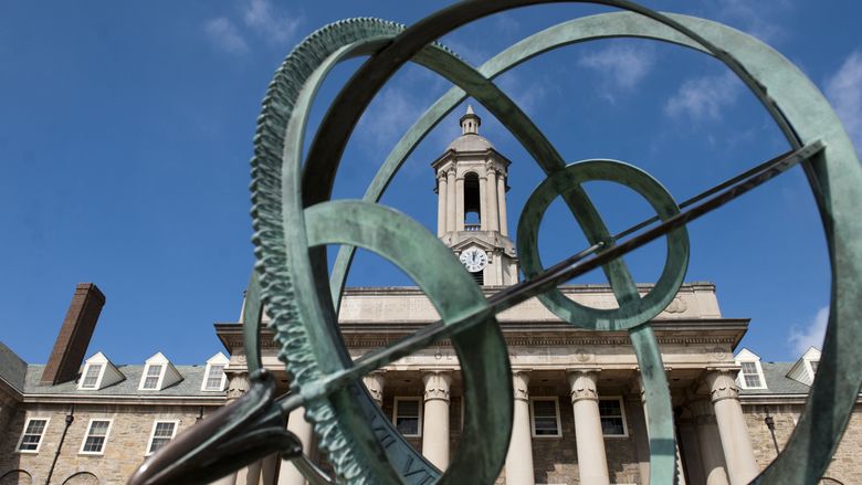 Old Main blue skies