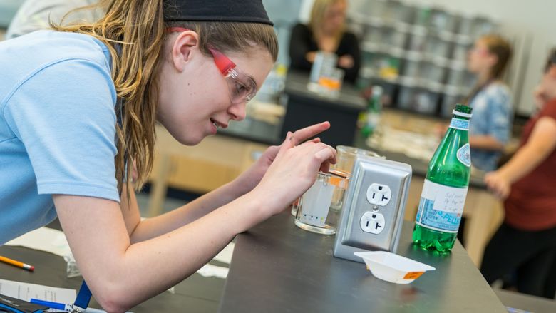 7th-grade girl explore Chemistry 