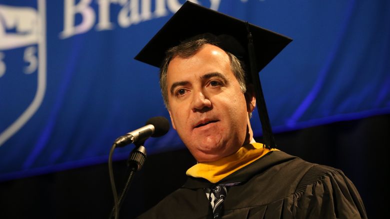 Mike Arata speaks at graduation