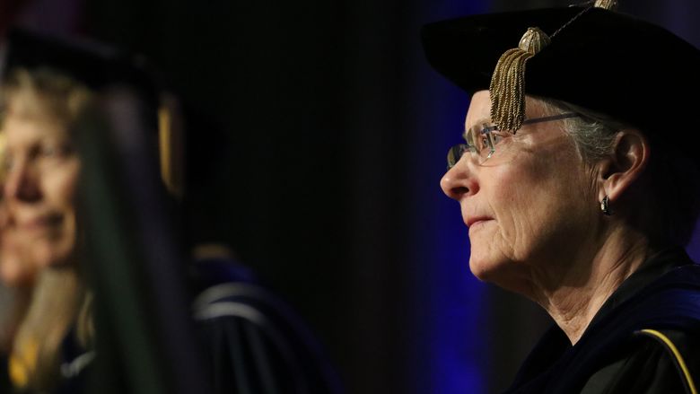 Brandywine chancellor sits on stage