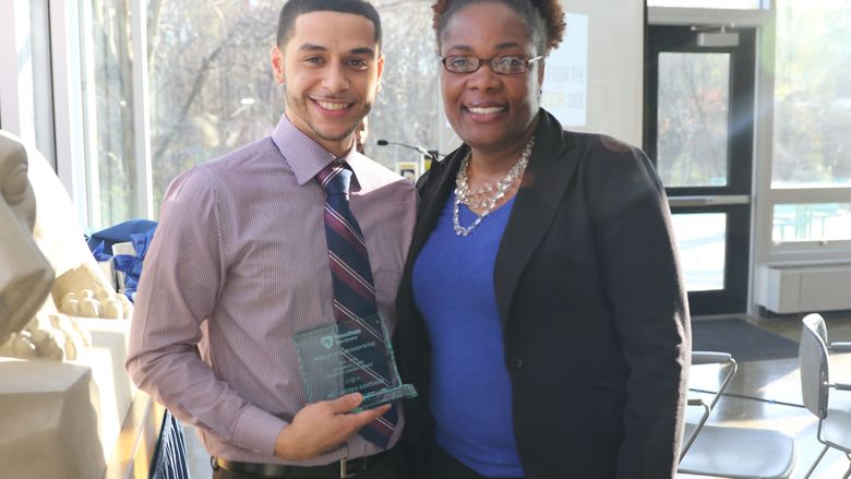 Alexander Rivera-Santiago and Ronika Money-Adams stand together