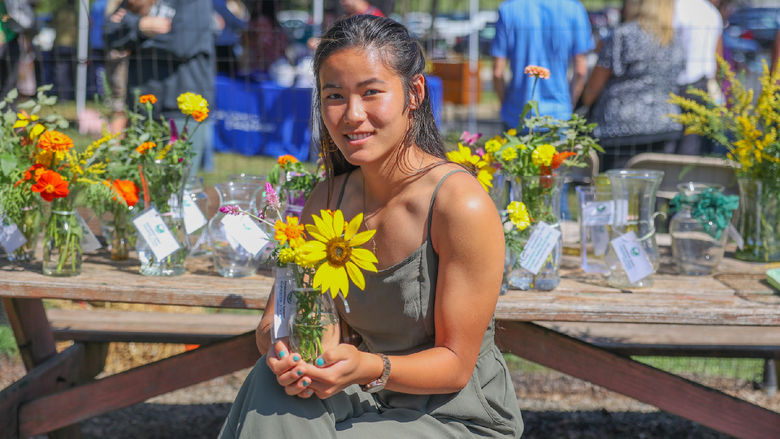 Rose holding flowers