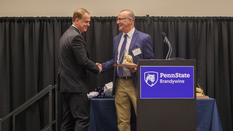 man receiving award